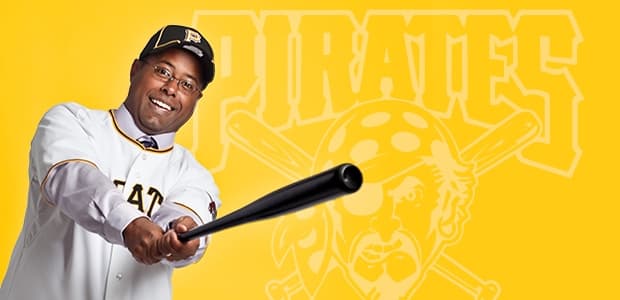 Tyrone Brooks in a Pirates baseball uniform, holding a baseball bat