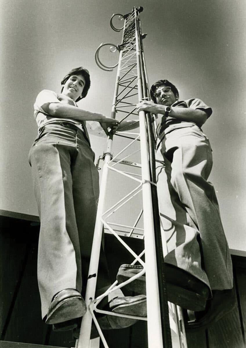 two students on radio tower