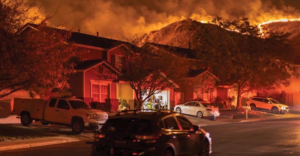 fire burns down houses